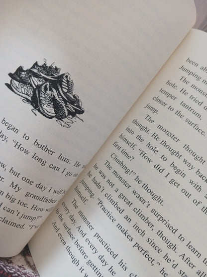 Campfire Stories by JD England, sample inside page with text and a sketch that depicts a pile of sneakers.